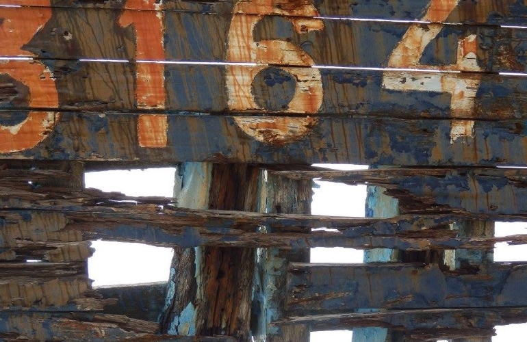 A rotted wooden hulk